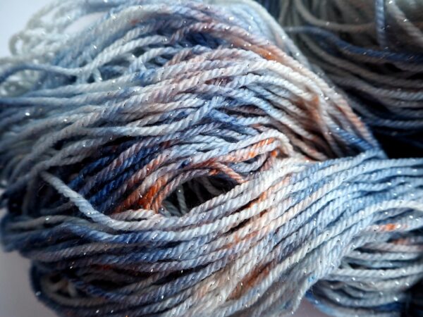 hand dyed yarn in grey, peach and dark blue