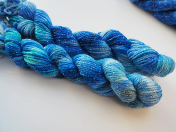 hand dyed mini skein in merino lurex, blue and white