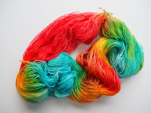 hand dyed yarn in blue, yellow, green and red