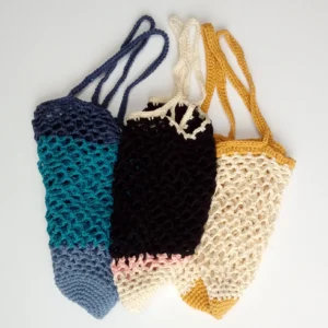 blue and turquoise bag, black and pink bag and yellow and mustard bag, crocheted