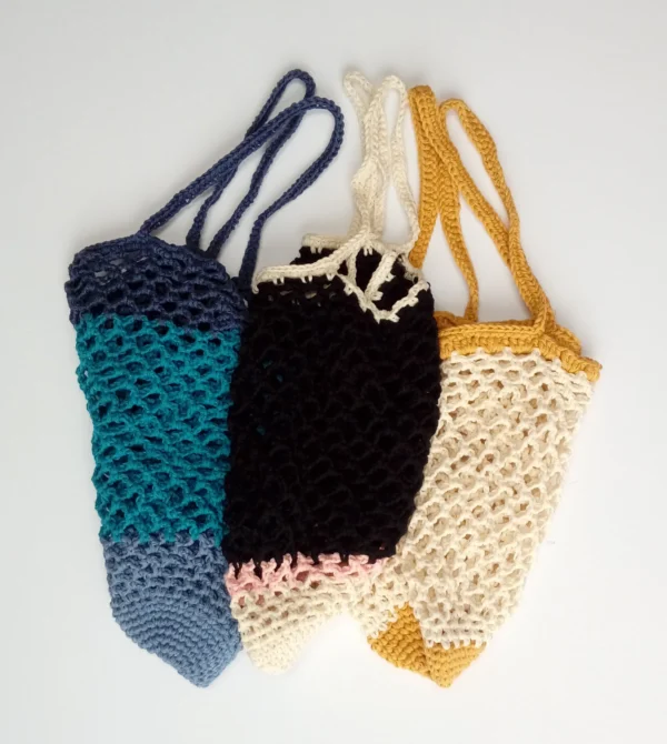 blue and turquoise bag, black and pink bag and yellow and mustard bag, crocheted